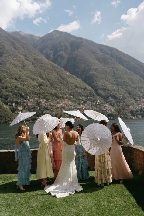 A vibrant intimate wedding on Lake Como at Villa Regina Teodolinda. This luxury Italian fusion wedding in Italy blended chic and modern elements, including Pnina Tornai and Selkie gowns, calla lillies, and parasols. Como Laglio was the perfect town for Bri and Robby to hold their destination wedding! Portofino Italy Aesthetic Wedding, Lake Como Wedding Bridesmaid, Lake Como Dinner Party, Italian Wedding Bridal Party, Spring Italy Wedding, Dream Wedding Italy, Sicilian Wedding Theme Bridesmaid Dresses, Italian Wedding Lake Como, Intimate Wedding Italy