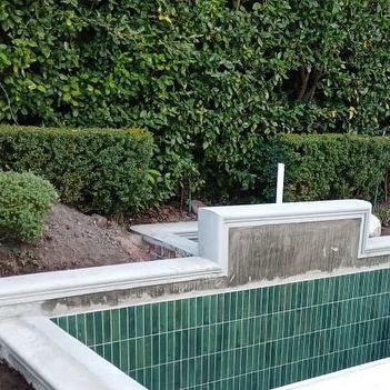 Tone Alexander Design Studio on Instagram: "This tiny little emerald gemstone pool is almost complete . It always amazes me how the little ones take the longest . Can’t wait for the custom made spouts to arrive . Lume green tiles from @pudlo #tonealexanderdesignstudio" Green Tile Swimming Pool, Pool With Green Tile, Emerald Green Pool Tiles, Vertical Pool Tile, Green Tile Pool, Italian Pools, Green Pool Tiles, Dark Green Tile, Pool Plaster