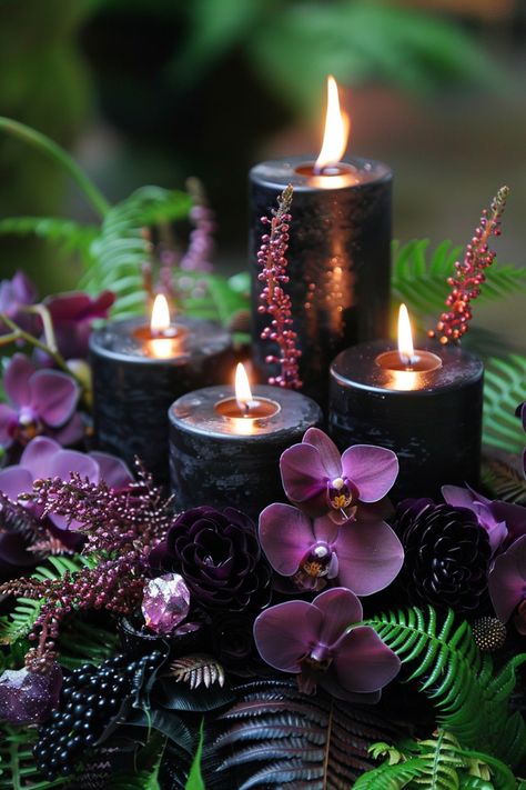 Create a dramatic ambiance with moody wedding centerpieces in rich colors and textures. Get inspired here. Fall Spooky Wedding Ideas, Maroon And Dark Purple Wedding, Moody Wedding Bridesmaids, Moody Enchanted Forest Wedding, Dark Purple And Burgundy Wedding, Deep Purple Wedding Decor, Masquerade Wedding Ideas, Dark Fairytale Wedding Decor, Dark Romantic Wedding Reception