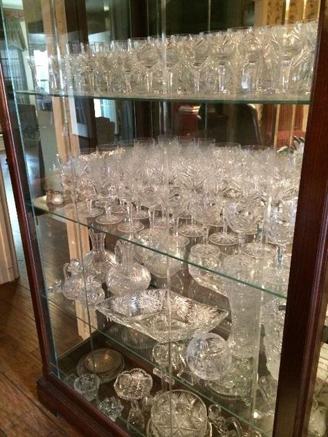 Display cabinet of cut glass, crystal, & glassware   New Divide & Conquer sale starting this Thursday, February 12-14; check out the details here:  http://divideandconquerofeasttexas.com/nextsales.php  #estatesales #consignments #consignment #tyler #tylertx #tylertexas #organizing #organizers #professionalorganizer #professionalorganizers #movingsale #movingsales #moving #sale #divideandconquer #divideandconquerofeasttexas #divideandconquereasttexas #marthadunlap #martha #dunlap How To Display Crystal Glassware China Cabinets, Crystal Cabinet Display, Crystal Glassware Display Ideas, Waterford Crystal Display Ideas, Crystal Glassware Display, Glassware Display, Crystal Glassware Antiques, White Bookshelf, Glass Cabinets