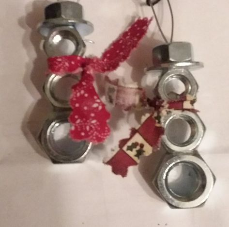 Snowman made of metal nuts and washer Washer Snowman Ornament, Nut Snowman, Tool Ornaments, Hardware Ornaments, Tool Crafts, Washer Crafts, Bed Spring Crafts, Welding Crafts, Snowman Faces