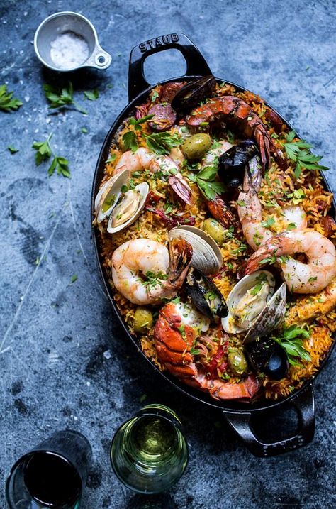 Indulge in the flavors of Skillet Grilled Seafood and Chorizo Paella, a simple and mouthwatering dish that requires just one pan. Perfect for a hassle-free meal, explore the recipe at halfbakedharvest.com. Chorizo Paella, Grilled Seafood Recipes, Seafood Paella, Paella Recipe, Grilled Seafood, One Pan, Fish And Chips, Grocery List, Food App