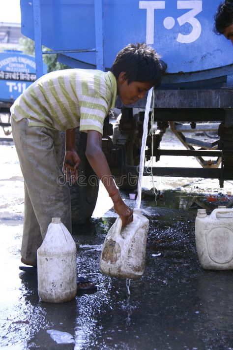 Water shortage. Delhi, India - 22 September 2007. Young boy collecting drinking , #affiliate, #India, #September, #Water, #shortage, #Delhi #ad Water Shortage, 22 September, Delhi India, The Capital, Drinking Water, Editorial, Stock Photos, India, Water