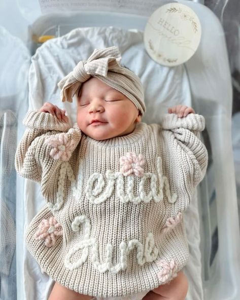 Little Miss 🤍🤍Neriah June🤍🤍 is completely PRECIOUS all snuggled in her custom sweater!! Such a perfect blessing with the most beautiful face. Welcome to the world, sweet angel!!! #themodmango #themodmangobabyco #babysweater #babynameannouncement #newborngift #newborngiftideas #babygirlsweater #newbornsweater #milestonesweater #handembroidery #handembroidered #custombabyboutique Baby Girl Announcement Outfit, Newborn Going Home Outfit Girl, Baby Sweater With Name, Embroidered Baby Sweater, Sweater With Name, Personalized Newborn Outfit, Baby Going Home Outfit, Coming Home Outfit Baby Girl, Embroidery Yarn