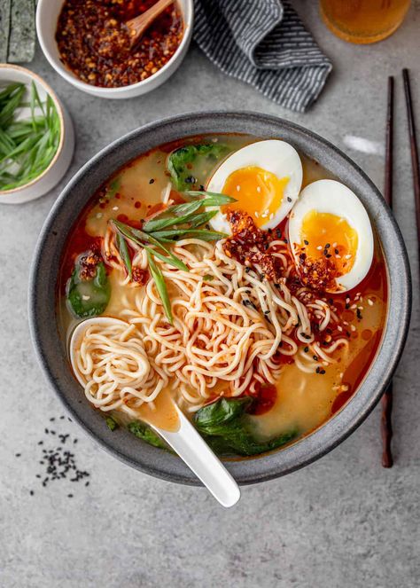 Transform instant ramen into a colorful, flavorful bowl of Easy Miso Ramen with just a handful of ingredients and 30 minutes. This instant ramen recipe is endlessly adaptable and irresistibly cozy. #ramen #noodles #miso #asianrecipe #easyrecipe #vegetarian Thai Vegan, Miso Ramen, Ramen Noodle Soup, Vegan Ramen, Ramen Soup, Spicy Thai, Delicious Soup Recipes, Ramen Recipes, Ramen Noodle