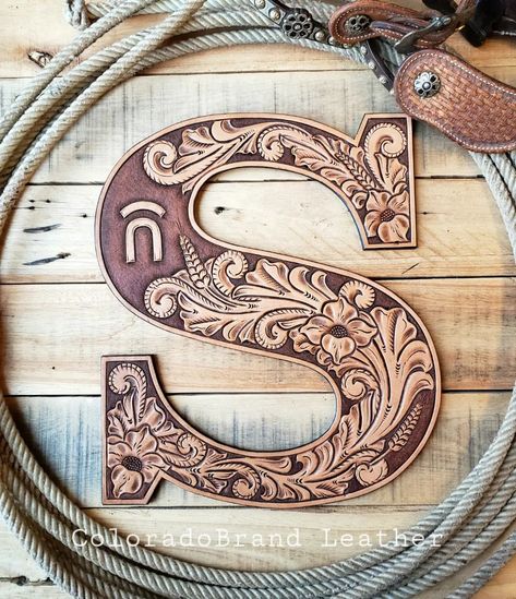 Erin Moyer | The choice to go with some classic western style tooling on this branded "S" was perfect. Don't get me wrong, I love the letters with all… | Instagram Tooled Leather Lettering, Leather Tooled Letters, How To Do Leather Work, Leather Tooling Letters, Western Tooled Leather Patterns, Leather Tooling Projects, Tooled Leather Projects, Western Leather Tooling, Western Tooling Tattoo