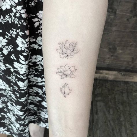 Blooming lotus flower tattoo on the left inner forearm. Blooming Lotus Flower Tattoo, Blooming Flower Tattoo, Lotusblume Tattoo, Small Lotus Tattoo, Lotus Tattoos, Army Tattoos, Lotus Tattoo Design, Flower Tattoo Meanings, Flower Blooming