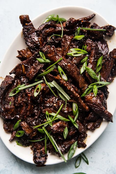 Crispy, delicious beef infused with intense flavors—this bulgogi beef recipe stands apart from the crowd. Marinate overnight, and let your grill do the rest! Roast Beast, Best Grill Recipes, Soy Sauce Marinade, Korean Bbq Beef, Cucumber Kimchi, Vietnamese Sandwich, Bulgogi Recipe, Steak And Onions, The Modern Proper