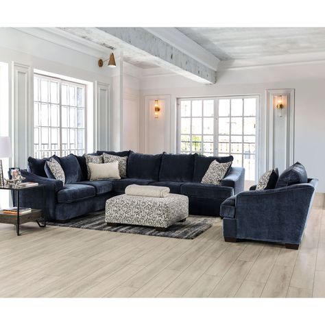 Skirting the line between casual and refined style, this navy blue sectional sofa is a lovely centerpiece in a modern family room. Patterned pillows add softness to wide track arms while welt trim provides a clean, classic finishing touch. Navy Blue Sectional, Navy Sectional, Blue Couch Living Room, Blue Sectional, Ottoman Furniture, Fabric Sectional Sofas, Sectional With Ottoman, Fabric Sectional, Ottoman Set