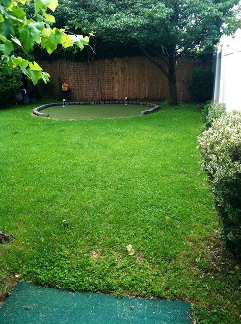 My dad has always been a handy man, so it was no surprise to me when he decided to build himself his own personal putting green for Father's Day. He saved thousands on the project! Here's how he said he did it! Materials: AstroTurf ($2/sq ft.) 10 50-pound bags of playground sand (3.75/each) 2"x6"x12' board ($9) Border stone ($3/each) 2 portable putting cups ($10/each) 4'x4' chipping mat (50$) "We had a 14' diameter above-ground pool. When I took it down, the grass w… Playground Sand, Backyard Golf, Stepping Stone Walkways, Me When He, Outdoor Living Ideas, Green Backyard, Patio Privacy Screen, Golf Diy, Golf Chipping