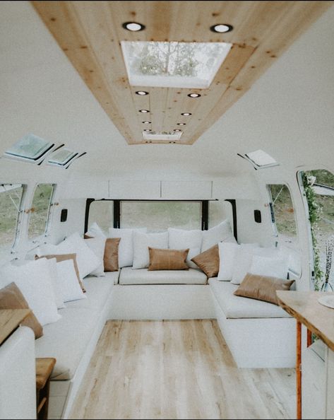 11 Wow-Worthy Airstream Remodels | RV Inspiration Diy Airstream Remodel, Rv Remodel Ideas, Rv Skirting, Rv Winterizing, Airstream Living, Rv Inspiration, Built In Couch, Interior Light Fixtures, Airstream Remodel