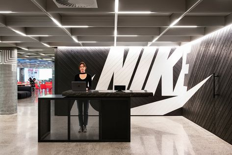 Nike Office Interiors, Nike Corporate Office, Gym Environmental Graphics, Nike Office Design, Bills Stadium, Pos Counter, Nike Office, Ceo Office Design, Sport Office