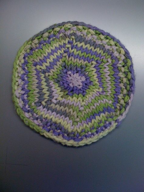 These coasters are great for beginners just learning to increase and work in the loop. You will always see knitted square coasters, but circular are just a little less common. Happy Stitching!  &nb... How To Knit A Round Coaster, Knit Coaster Pattern, Knit Coasters, Knitted Coasters, Knit Coaster, Knitted Washcloth Patterns, Coaster Pattern, Dishcloth Knitting Patterns, Irish Moss