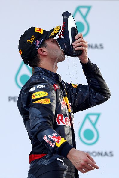 Daniel Ricciardo of Australia and Red Bull Racing celebrates his win on the podium during the Malaysia Formula One Grand Prix at Sepang Circuit on... F1 Wallpaper Ricciardo, Daniel Ricciardo Wallpaper Red Bull, F1 Wallpaper Daniel Ricciardo, Daniel Riccardo Wallpapers, Daniel Ricciardo Wallpaper Iphone, F1 Drivers Wallpaper, Daniel Ricciardo Aesthetic, Formula One Wallpaper, Daniel Ricciardo Wallpaper