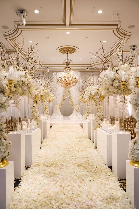 white-and-gold-ballroom-wedding-ceremony-white-flower-petals-arrangements-gold-molding-chandelier White And Gold Wedding Themes, Elegant Wedding Ceremony, White Wedding Decorations, White Wedding Theme, Luxury Wedding Decor, Gold Wedding Theme, Gold Wedding Decorations, Party Deco, Venue Decorations