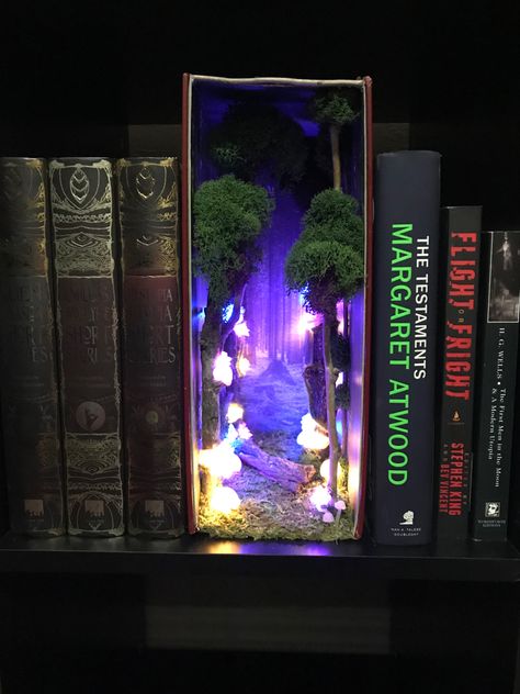 Illuminated mushroom forest book nook/insert. Hand made mushrooms from clay. Forest Book Nook, Book Nook Insert, Forest Book, Bookshelf Art, Mushroom Forest, Miniature Rooms, Fairy Doors, Book Nook, Miniature Books