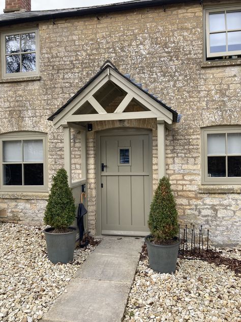 Rendered Porch, Cottage Front Porch Ideas, Farmhouse Front Doors Uk, Cottage Composite Front Door, Front Door Cottage, Porch Ideas Entrance, Cottage Style Front Doors, Cotswold Stone New Build, Stone Front House