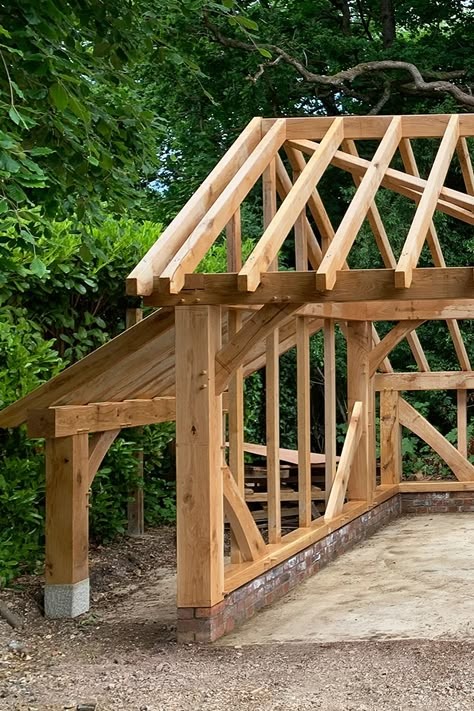 A great view of one of our frames without cladding and roofing. It's a full oak frame with 195mm oak posts and curved 'cathedral' style braces in the stud walls. Get in touch for a trade price.  #oakgarage #garage #oak #outbuilding #propertydevelopment Oak Frame Lean To Porch, Oak Framed Garage, Oak Frame Garage With Room Above, Oak Timber Frame, Oak Framed Annexe, Timber Frame Kits, Carport Plans, Timber Truss, Timber Frame Building