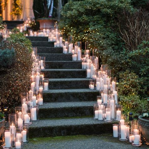 Weddings In Woodinville on Instagram: “Make your day glow. A candle lit stairwell makes entrance and exits even more magical from dusk til dark.  Participants in the…” Candlelit Dance Floor, Candlelit Outdoor Wedding, Wedding Candles On Floor, Candle Outdoor Wedding, Romantic Wedding Candle Decor, Gold Vintage Wedding Decor, Weddings In Nature, Bougie Wedding Ideas, Wedding Decor Timeless