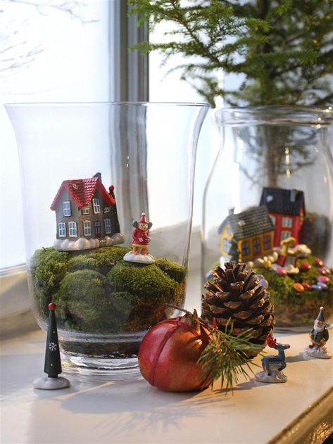 With this cute coloured VINTERFINT houses you can create a super easy christmas decor. Take a POMP glass lantern or a big vase, collect some moss and make your own little fantasy Christmas village. 💫 #myIKEA #decor #deko #cosyhome #cosyliving #weihnachtsdeko #deko #weihnachten #xmasideas #christmashome #homeinspo #fensterdeko #windowdecor #ikeadeko #ikeadecor #interior #christmasdecor #xmas #advent #interiør #dekoideen #weihnachten #natale #decorazioni #winterdecor #IKEA Vinterfint Ikea, Christmas Table Centerpieces Ikea, Ikea Christmas 2022, Baubles In Vases Christmas, Christmas Ikea Lanterns, Ikea Christmas Decorations, Hygge Party, Ikea Vinter 2021 Christmas Tree, Ikea Christmas