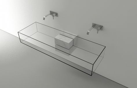 Milan-based architect Victor Vasilev designed KUB, a nearly invisible bathroom sink. The minimal design is available in two sizes and features a combination of marble and glass. When looking at the structure from the side, the sink seems to disappear into the room. The KUB basins belong to a series of objects, which all carry Vasilev’s signature clean style.  All images © Victor Vasilev | Via: Highsnobiety Unique Sinks, Modern Tub, Bathroom Sink Design, Glass Basin, Washbasin Design, Glass Sink, Basin Design, Glass Cube, Sink Design