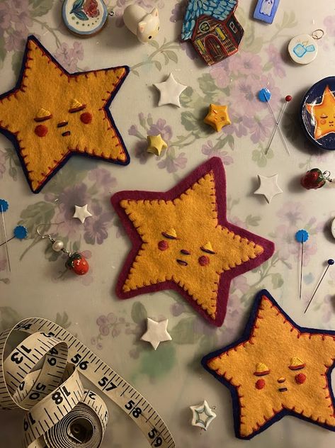 Get into the holiday spirit this year by crafting your own Sleepy Star Felt Ornament! Perfect for beginners and experienced crafters alike, this DIY sewing pattern guides you through every stitch with easy-to-follow instructions and step-by-step photos. Ideal for handmade holiday décor, gift tags, or year-round accents, this cute ornament is a wonderful addition to any Christmas tree, holiday gathering, or family craft night. :)

Pattern Includes:
* Printable templates for easy cutting
* Detailed instructions with images to guide your hand-sewing process
* Visual stich tutorials for multiple embroidery techniques Diy Felt Wall Decor, Hand Painted Star Ornaments, Diy Gift For Traveler, Handmade Crafts For Christmas, How To Make Your Own Christmas Ornaments, Waldorf Christmas Ornaments, Sewn Ornaments Christmas, Star Sewing Pattern, Easy Cute Embroidery Designs