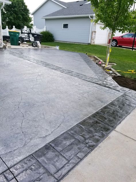 Imprinted Concrete Patio Ideas, Stamped Driveway Concrete, Stamped Concrete Around Pool Ideas, Concrete Stamping Ideas, Grey Stamped Concrete Patio, Stamped Concrete Driveway Ideas, Cement Types, Stamped Driveway, Concrete Driveway Ideas