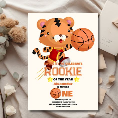 Celebrate your rookie's first year with our Rookie of the Year 1st Birthday Basketball Invitation! Perfect for your little MVP's big day. Don't miss out on this slam dunk celebration! 🏀🎉 #BasketballBirthday #RookieOfTheYear #1stBirthday #MVP #BasketballParty #SportsTheme #BirthdayInvitation #BasketballLove #CelebrateWithUs #LetTheGamesBegin Basketball Graphics, Basketball Invitations, Sports Birthday Invitations, Basketball Tickets, Basketball Party, Basketball Birthday, Rookie Of The Year, Sports Birthday, 1st Birthday Invitations