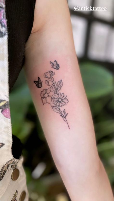 Floral Butterfly Arm Tattoo, Bouquet Of Flowers Tattoo With Butterfly, Floral Tattoo Butterfly, Two Butterflies With Flowers Tattoo, Dainty Feminine Tattoos Arm, Fine Line Floral Butterfly Tattoo, Butterflies On Flowers Tattoo, April Birth Flower Tattoo With Butterfly, Birth Flowers With Butterfly Tattoo