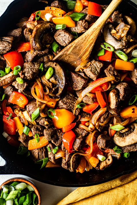 One Skillet Beef Tips with Peppers and Onions - ghee/avocado oil (might reduce), sirloin steak, salt, black pepper, ACV, garlic cloves, red bell pepper, orange bell pepper, yellow onion, sliced baby bella mushrooms, green onion (for garnish) Beef Tips Healthy, Recipe For Beef Tips, Green Peppers And Onions, Crock Pot Beef Tips, Beef Tip Recipes, Crock Pot Beef, Easy Whole 30 Recipes, Steak Tips, Steak And Mushrooms