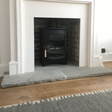 How to Install a Hearth on a Fireplace Stone Hearths, Fireplace Hearth Stone, Wood Burner Fireplace, Wood Burning Stoves Living Room, Log Burner Living Room, Hearth Tiles, Bedroom Built In Wardrobe, Slate Hearth, Basement Living Rooms