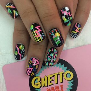 Rewind time, and channel the ’80s with some neon print nail art. | 21 Manicures That Will Take Your Formal Look To The Next Level 1980s Nail Art, Vapor Wave Nails, Neon Nail Pigment Designs, 80’s Nails, Neon Abstract Nails, 80s Inspired Nails, 90 Nails The 90s Art Designs, 80s Nail Art, 90s Inspired Nails