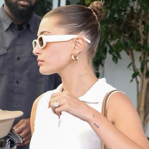 Hailey Bieber Wrist Tattoo, Hailey Beiber Tattoos, Wrist Tattoo Placement, Summer 2022 Hair Trends, Glaze Nails, Wisdom Tattoo, 2022 Hair Trends, Amor Tattoo, 22 Tattoo