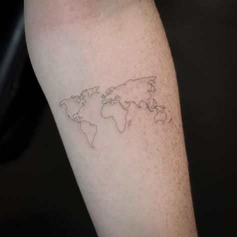 Minimalist World Map Tattoo by jakubnowicztattoo Geographic Tattoo, Cool World Map, World Map Tattoos, Map Tattoo, Cool World, Inner Forearm Tattoo, Map Tattoos, Inner Forearm, Minimalist Tattoos