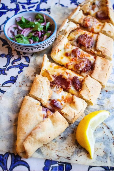 Turkish pide with sujuk and cheese Pide Recipe, Turkish Snacks, Turkish Pide, Shaped Pizza, Cooking Bread, Beef Sausage, Turkish Food, Smoked Beef, Spicy Beef