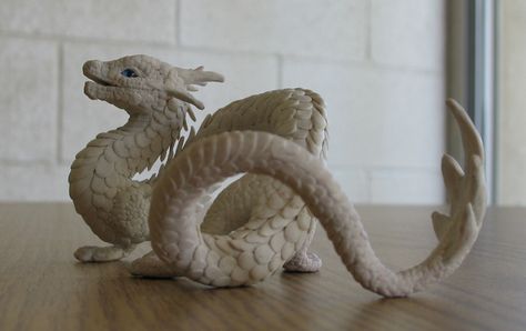 Blue-eyed gift dragon by tallydragon Polymer Clay Dragon, Clay Dragon, Dragon Sculpture, Tanah Liat, Dragon Statue, Deviant Art, White Dragon, Clay Art Projects, Sculpting Clay