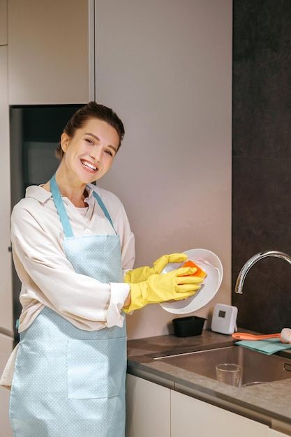 Photo dish washing. housewife cleaning t... | Premium Photo #Freepik #photo #kitchen-cleaning #house-cleaning #domestic #woman-cleaning Housewife Cleaning, Woman Cleaning, Photo Kitchen, Magic Broom, Cleaning Videos, Dish Washing, Cleaning House, Rubber Gloves, Cleaning Dishes