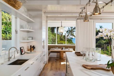 Cindy Crawford's Unexpected Side Hustle Just Made Her $15 Million  #refinery29  http://www.refinery29.com/2015/05/87863/cindy-crawford-selling-malibu-home-pictures#slide-4  A breakfast nook with a side of ocean views. Kitchen Island With Columns, Modern Cottage Kitchen, Beach Cottage Kitchen, Decor Ikea, Cottage Kitchens, Classic Kitchen, Wooden Floors, Kitchen Concepts, Modern Cottage