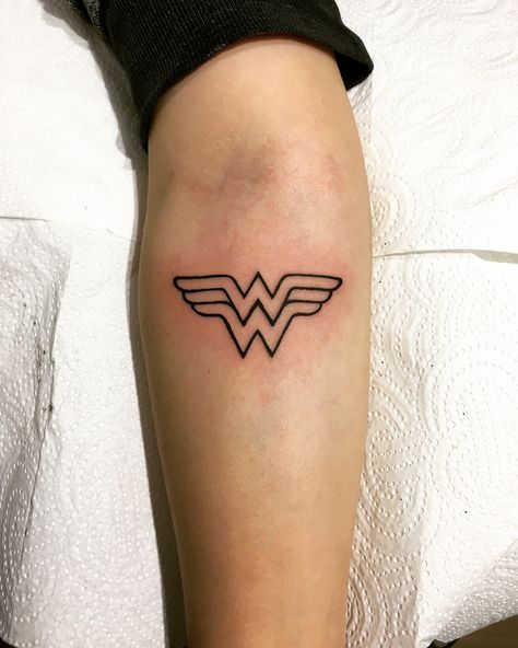 Wonder Woman Tattoo | Tattoo Ideas and Inspiration Small Wonder Woman Tattoo, Wonder Woman Logo Tattoo, Woman Tattoo Ideas, Wonder Woman Costume Diy, Wonder Woman Tattoo, Wonder Woman Quotes, Wonder Woman Drawing, Wonder Woman Artwork, Woman Tattoo