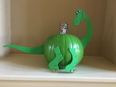 Book character Pumpkin decoration. No carving allowed. Arlo and Spot from The Good Dinosaur. Book Character Pumpkin, Arlo And Spot, Dinosaur Pumpkin, Book Character Pumpkins, Story Book Pumpkin, Halloween Pumpkin Crafts, Character Pumpkins, Pumpkin Books, Pumpkin Decorating Contest