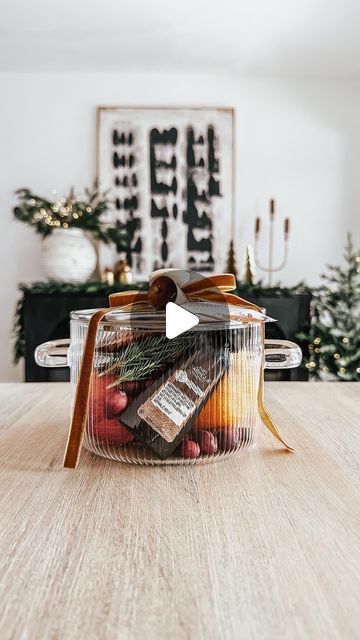 738K views · 30K likes | Jen Alvarez • Home Decor on Instagram: "Stovetop potpourri gift idea 🎁  comment “hostess” to get the link to shop this post straight to your inbox 🤍

This gift idea would be so cute as a hostess gift this holiday season or as a sweet housewarming gift. 
here’s what I used:
+ $25 glass pot
+ orange, small apples, rosemary, cranberries, vanilla, cinnamon and anise 
+ velvet ribbon and printable tag 

Shop this post in my bio on my @shop.LTK // link in bio https://liketk.it/4mOsF

#Itkgiftguide #Itkgiftspo #Itkhome #Itkholiday
#Itkunder50 #hostessgift #christmasdecor #holidaydecor #christmaspartyideas #holidayhostess #holiday #liketkit#amazonfinds #amazonmusthaves #amazonhome #kitchendecor #kitchenfinds #giftideas #itkunder100" Stovetop Potpourri Gift, Fall Pots, Potpourri Gift, Christmas Hostess Gifts, Glass Pot, Stovetop Potpourri, Printable Tags, Velvet Ribbon, Potpourri