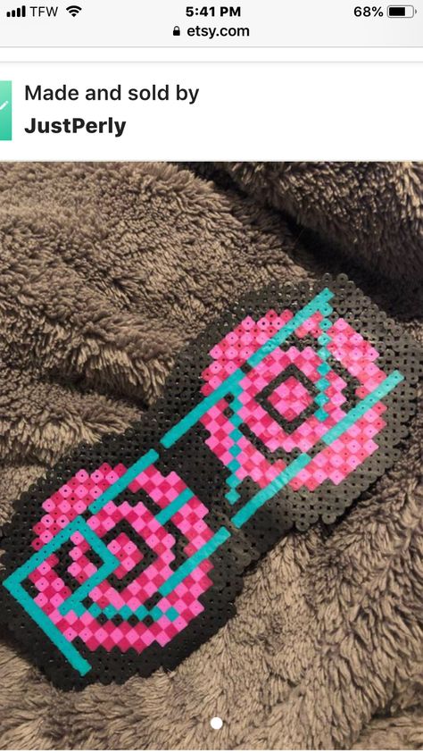 Rezz perler Rave Trinkets, Rezz Perler Bead Patterns, Festival Perler, Rave Perler Beads, Edc Perler, Rave Perler Bead Patterns, Perlers Edm, Edm Perler Bead Patterns, Perler Bead Rave Patterns