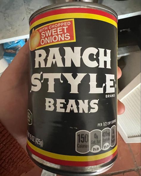 Someone holding up a can of Ranch Style Beans Canned Ranch Style Beans Recipe Ideas, Recipes Using Ranch Style Beans, Canned Ranch Style Beans Recipes, Recipes With Ranch Style Beans, Ranch Style Beans Recipe Ideas, Pot Roast Ranch, Ranch Beans Recipe, Ranch Style Beans Recipe, Ranch Beans