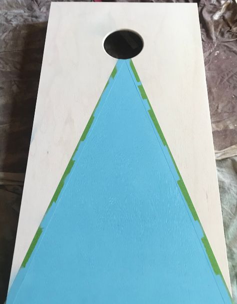 How to custom paint your own cornhole game! Easy steps to decorate your cornhole game for fun at parties, events, fundraisers or backyard play! #cornhole #howto #DIY | Poplolly Co Painting Cornhole Boards, Cornhole Paint Ideas, Cornhole Board Dimensions, Painted Corn Hole Boards, Stained Cornhole Boards, Diy Cornhole Boards, Corn Hole Diy, Cornhole Designs, Cornhole Decals