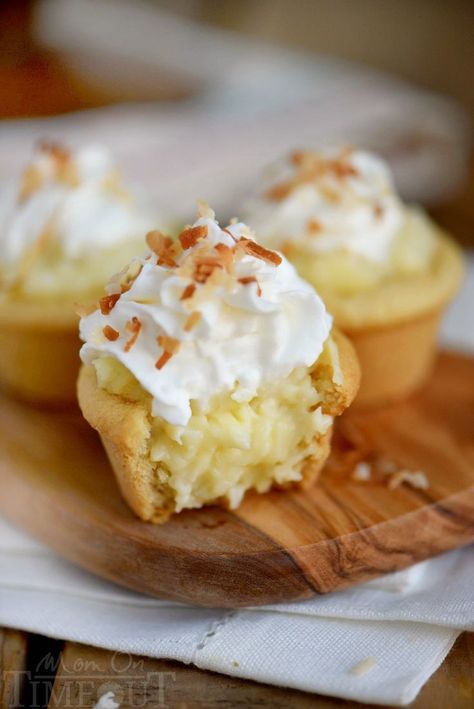 Coconut Cream Pie Cookie Cups! Two of my favorite desserts collide in this easy to make recipe that will have your guests oohing and aahing in no time! Cookie Cups Recipe, Coconut Cream Pie Recipes, Mom On Timeout, Cream Pie Recipes, Bite Size Desserts, Desserts Vegan, Coconut Cream Pie, Cookie Cups, Mini Pies