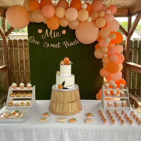 Great for a first birthday, or any birthday of a sweet one. Party at your door has all of your custom party decor needs! Peaches And Cream Birthday Party, Peach Color Birthday Theme, Sweet As A Peach First Birthday Decor, One Sweet Peach Balloon Arch, Peach 1st Birthday Party Decorations, One Sweet Peach First Birthday Party, Orange Bday Theme, First Birthday Peaches Theme, 1st Birthday Peach Theme