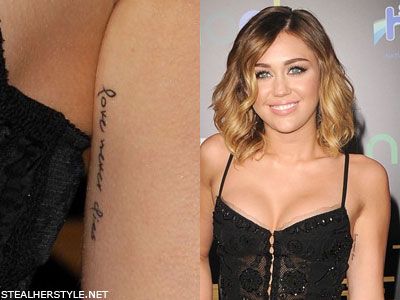 miley-cyrus-love-never-dies-tattoo Quote Tattoos Placement, Henna Ink, Dice Tattoo, Dream Catcher Tattoo, Bicep Tattoo, Tattoo Arm, Tattoo Designs For Girls, Love Never Dies, Trendy Tattoos