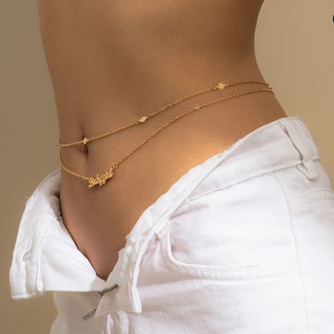 Give your waistline some attention with this shining gold-plated waist chain. Includes two silver-plated waist chains Full graphic text: Babygirl. Chain one: 28.7'' L with 9.8'' extender Chain two: 29.5'' L with 9.8'' extender Letters: 1.3'' L Lobster claw clasp Gold-plated copper Rhinestone Belly Chain, Jóias Body Chains, Wedding Body, Body Necklace, Waist Jewelry, Image Swag, Body Chains, Belly Jewelry, Chain Fashion