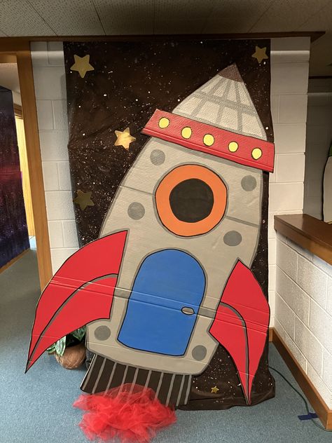 Diy Out Of This World Decor, Outer Space Props Diy, Spaceship Photo Booth, Preschool Graduation Space Theme, Outer Space Parade Float Ideas, Outer Space Book Fair, Outer Space Decorations Classroom, Astronaut Classroom Theme, Space Theme Book Fair