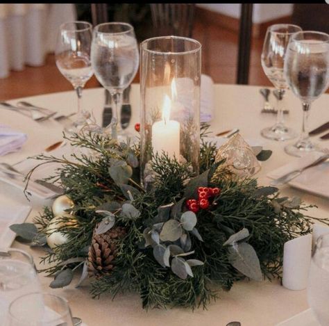 Simple Winter Centerpieces Wedding, Xmas Wedding Centerpieces, Pointsetta Wedding Centerpieces, Pine Table Centerpiece, Christmas Wedding Round Table Decor, Sweetheart Table Wedding Christmas, Winter Flower Centerpieces, February Wedding Centerpieces, Winter Sweetheart Table Wedding